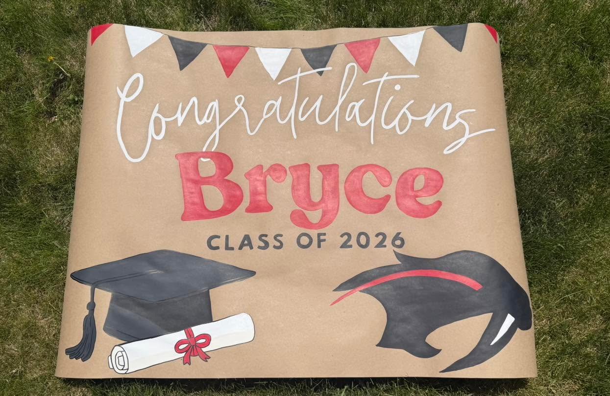 Hand-painted graduation banner by Banner Barn