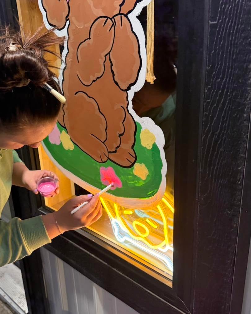 Hand-painted seasonal window art by Banner Barn